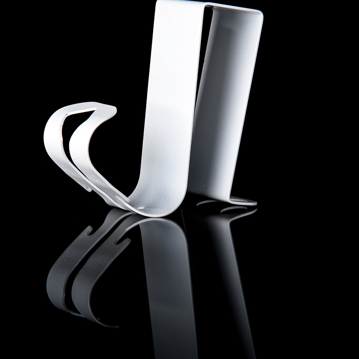 BANDZ-UP Portable Door Anchor - side view on black reflective surface